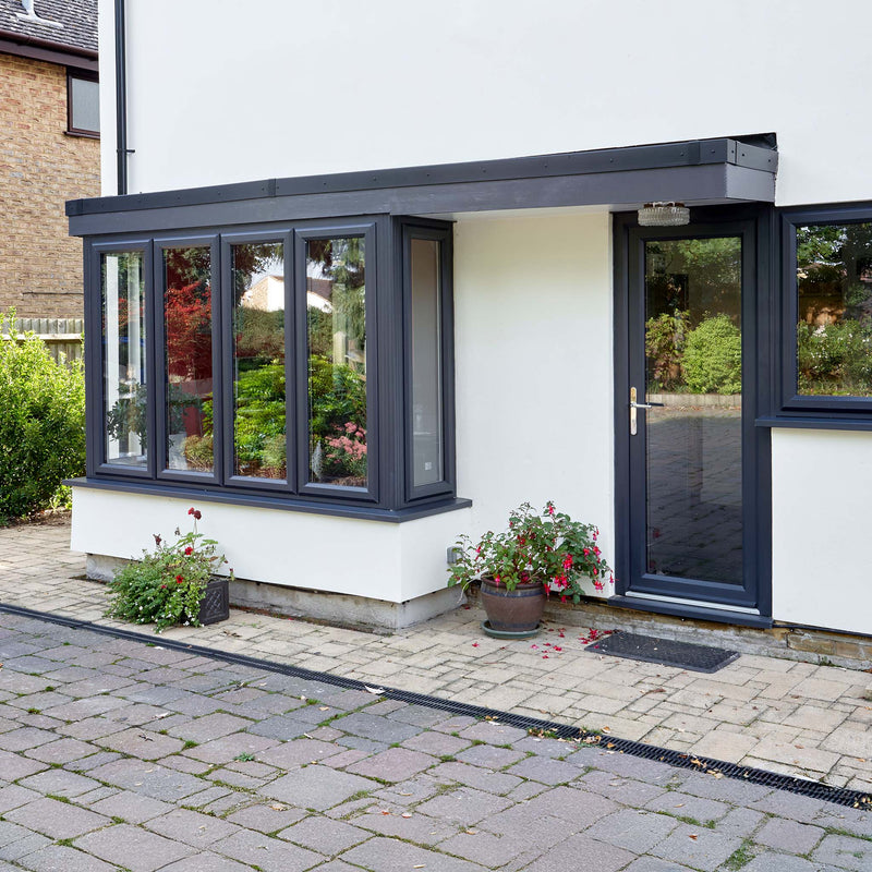 White House with Bay Window in Grey Aluminium
